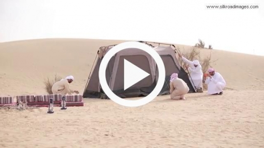 Friends putting up the tent