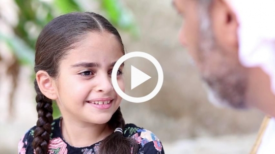 Girl chatting with grandfather