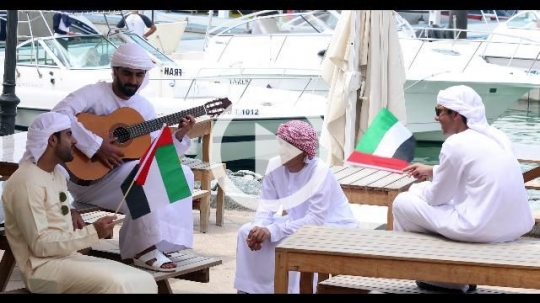 Arab men celebrating the UAE National Day|
