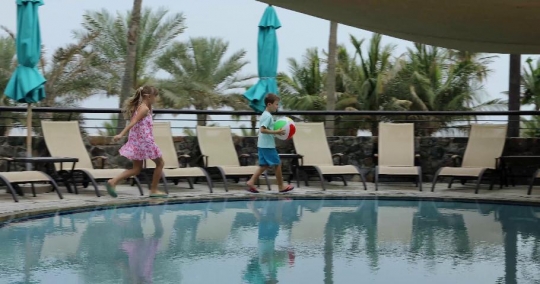 Western kids running by the pool|-