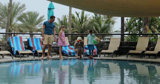 Western Family bonding by the pool|-