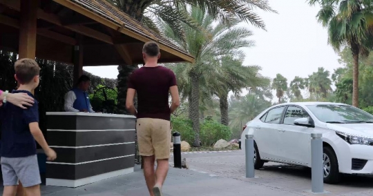 European family picking up their car|-