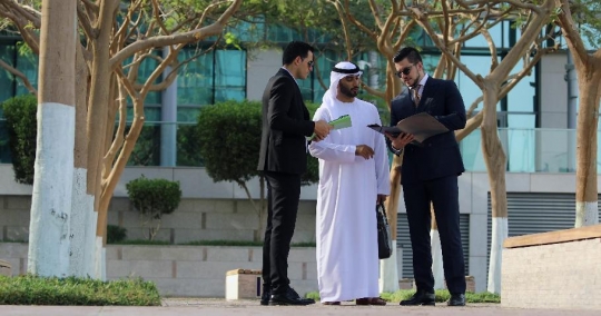 Businessmen talking to each other |-