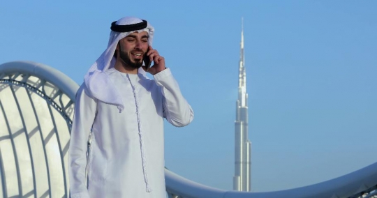 Arab Businessman makes a phone call|-