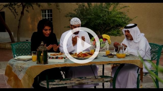 Middle Eastern family talking together before Iftar|