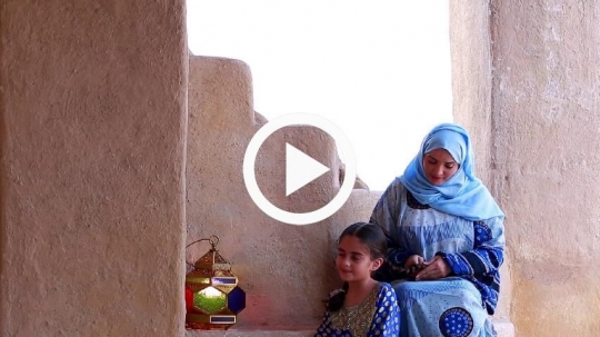 Girl with Mom sitting on the stairs