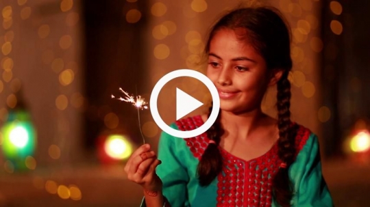 Girl celebrating with fiery matches