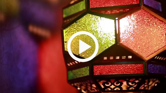 Close-up of lantern against the wall