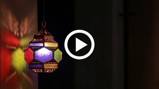 Beautiful lantern rotating against the wall