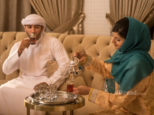 Couple drinking Arabic tea|-
