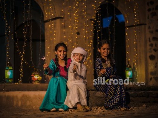 Kids celebrating eid|-