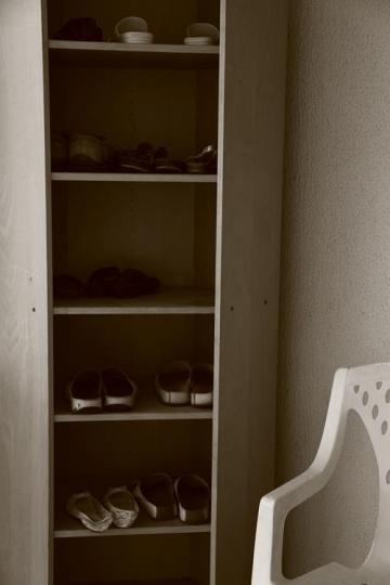 vintage wardrobe with shoes inside 