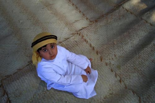 boy looking up at the camera