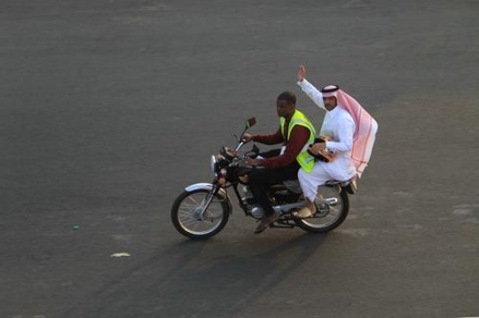 Saudi man riding a motorcycle