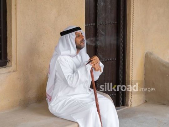 Old man smoking pipe|-