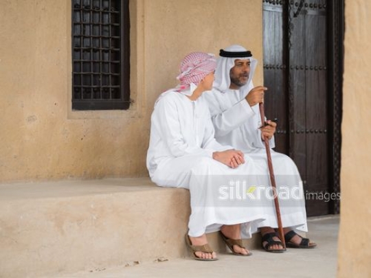 teenager in conversation with grandfather|-