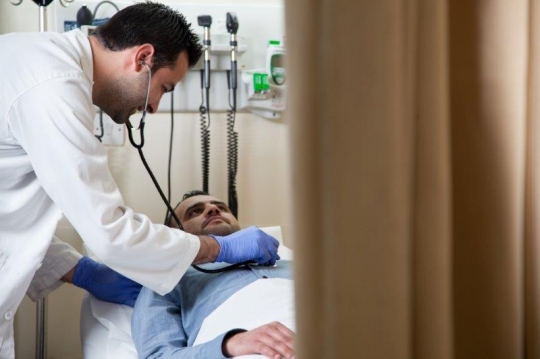 Doctor Examining Patient at ER