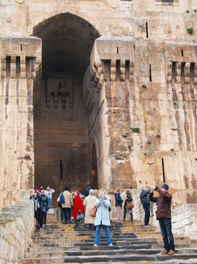 tourists visiting historical places in syria