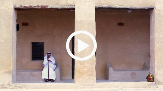 Old man contemplating outside