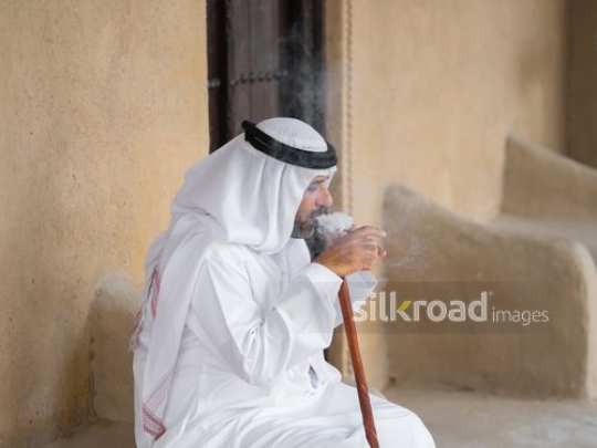 Old man smoking pipe|-