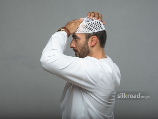 Man wearing traditional headdress|