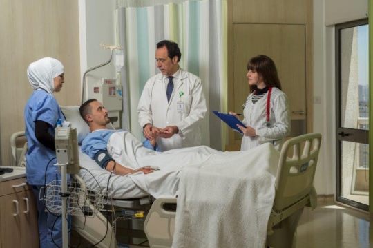 Doctors Checking on Patient at