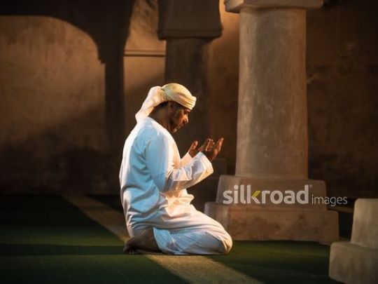 Old man praying inside the mosque|-