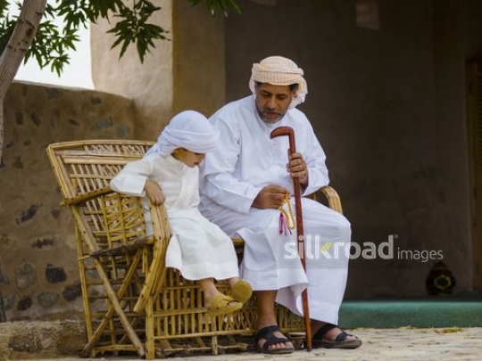 Old man spending time with grandson|-