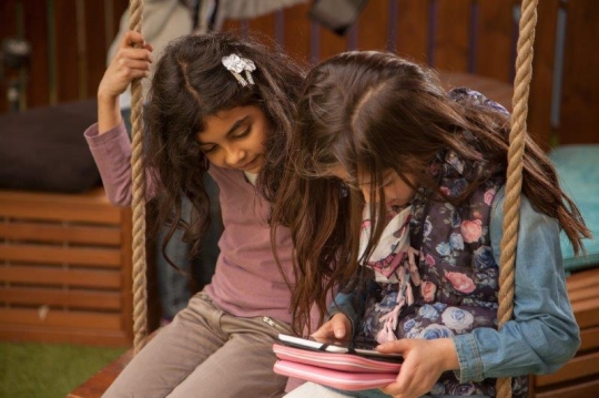 Young Girls and Smart Tablet