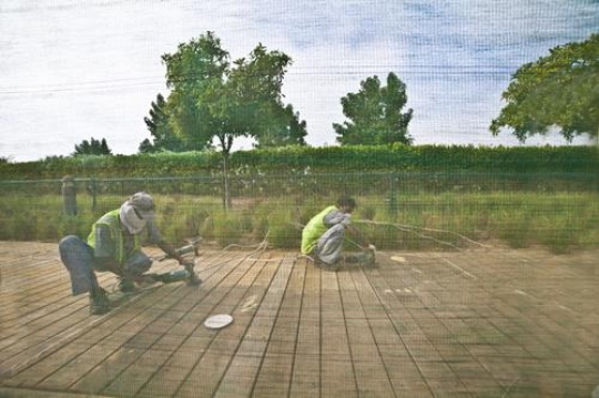 workers fixing parquet
