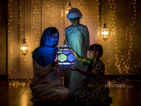 Mother with kids celebrating ramadan|-
