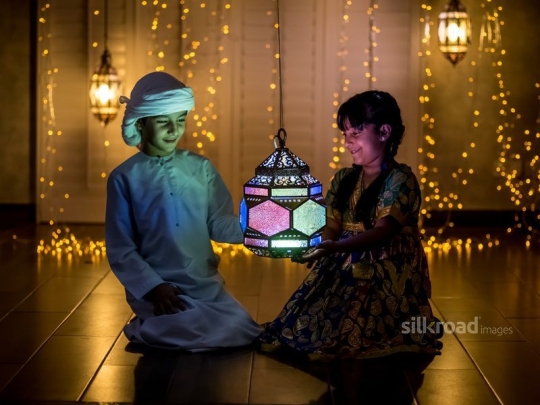 Boy and girl celebrating ramadan|-