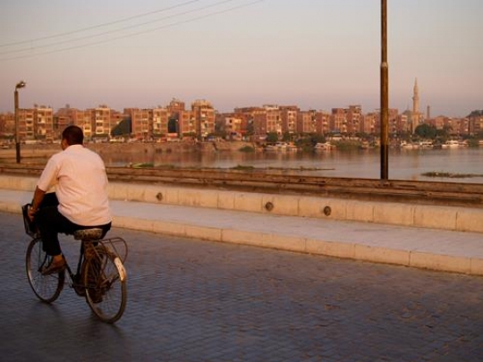 Egyptian man on bicycle