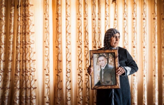 Palestinian Woman Mourning on her Lost Son at Construction Site