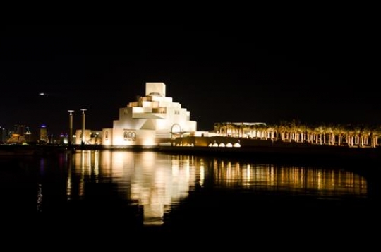 view of museum of islamic art in doha,qatar at night