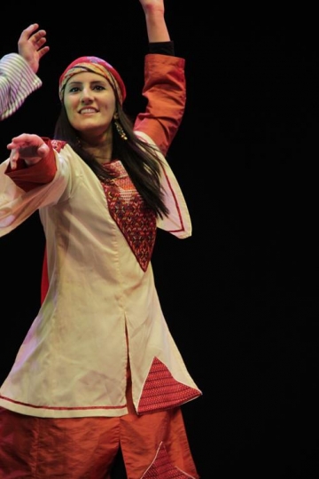 young woman dancing in theater