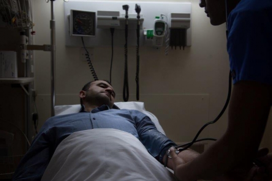 Doctor Examining Patient at ER