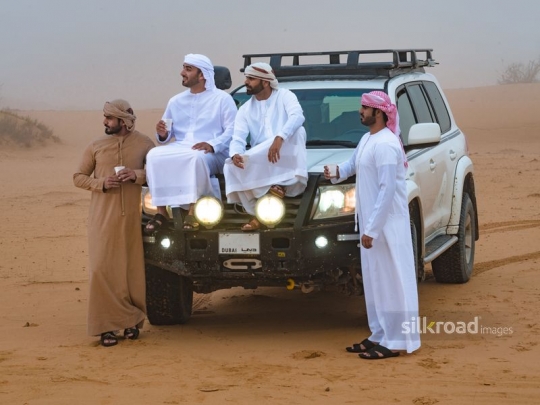Friends taking a break in the desert