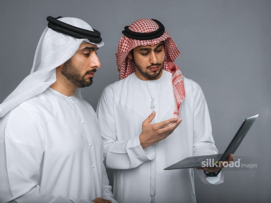 Arab man explaining to manager