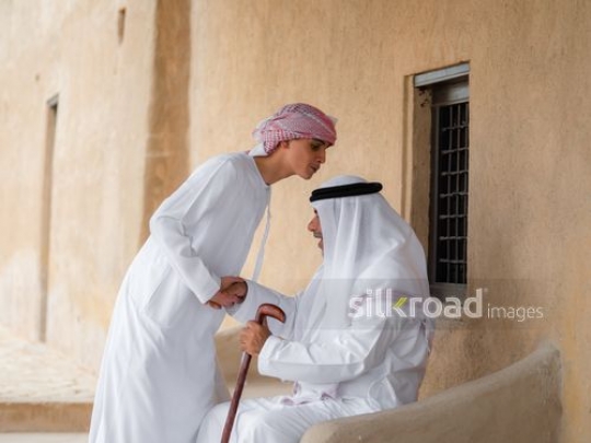 Teenager approaching grandfather|-