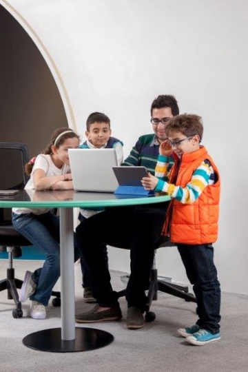 Kids and Teachers at Computer Class