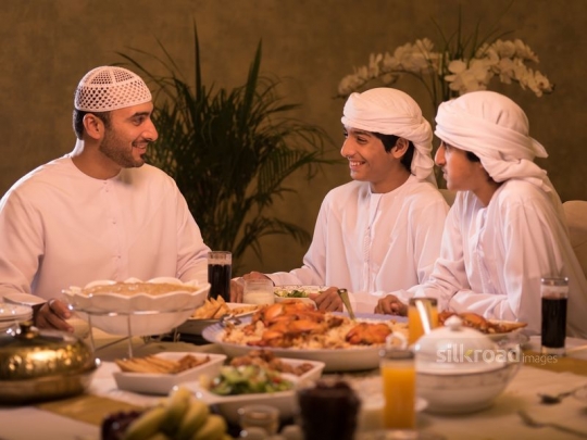 Father in conversation with boys|-