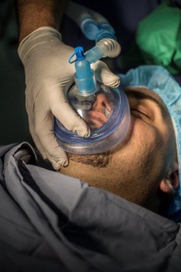 A Patient Under Anaesthetic Face Mask