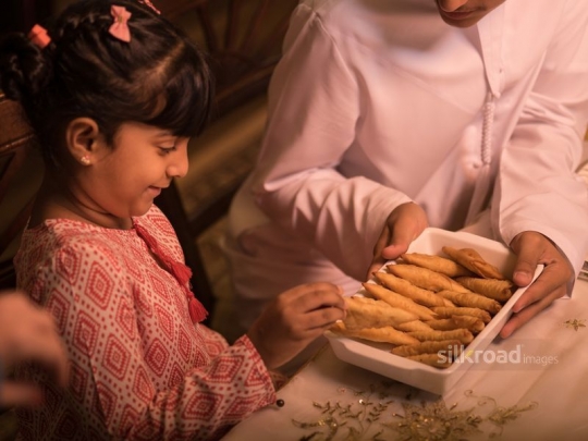 Girl taking puff pastry|-