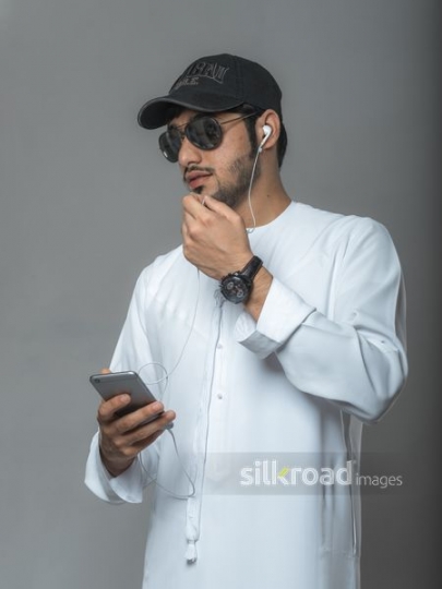 Funky young man speaking through the microphone