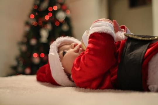 baby drinking form a bottle