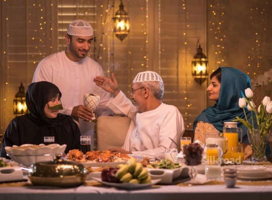 Man perfuming father|-