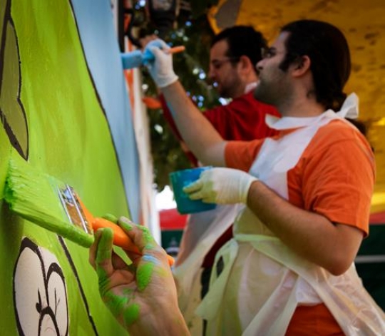 group of volunteer drawing on