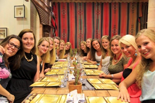 women taking a group photo