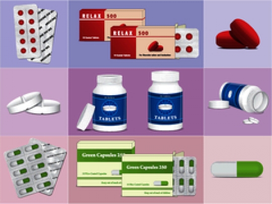 set of medication boxes with pills